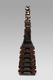 Jud Bergeron, "Stacked," 2024, cast bronze, cast hydrocal, bubinga wood, graphite and resin, bronze edition of 3, 60.5 x 16 x 16 inches